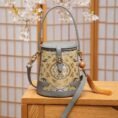Song_Brocade_Fragrant_Cloud_Silk_Bucket_Bag_-_SinoCultural-2483108