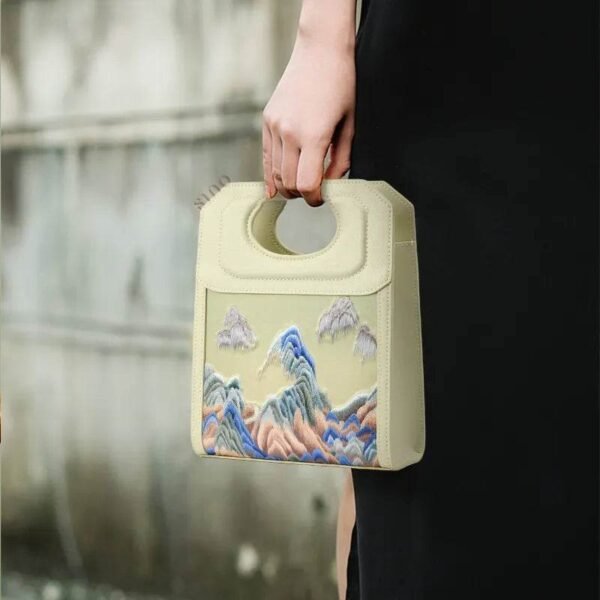 chinoiserie-mountains-embroidered-handle-bag-model-2 chinoiserie-mountains-embroidered-handle-bag-model-2