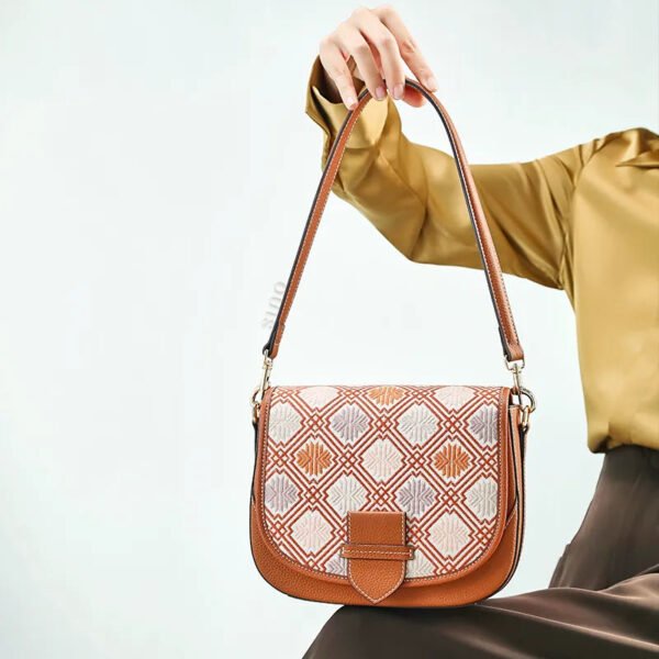 model-seated-holding-brocade-bag-on-lap model-seated-holding-brocade-bag-on-lap