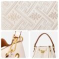 wanj-pattern-embroidered-leather-convertible-backpack-tote-detail-pattern-lock-strap