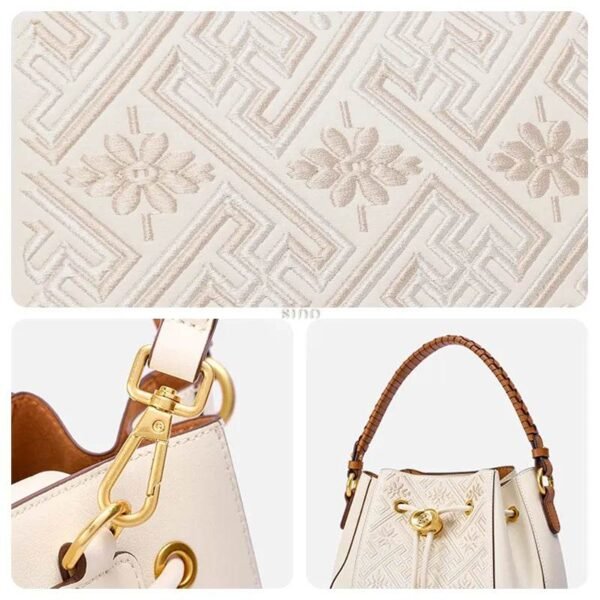 wanj-pattern-embroidered-leather-convertible-backpack-tote-detail-pattern-lock-strap wanj-pattern-embroidered-leather-convertible-backpack-tote-detail-pattern-lock-strap