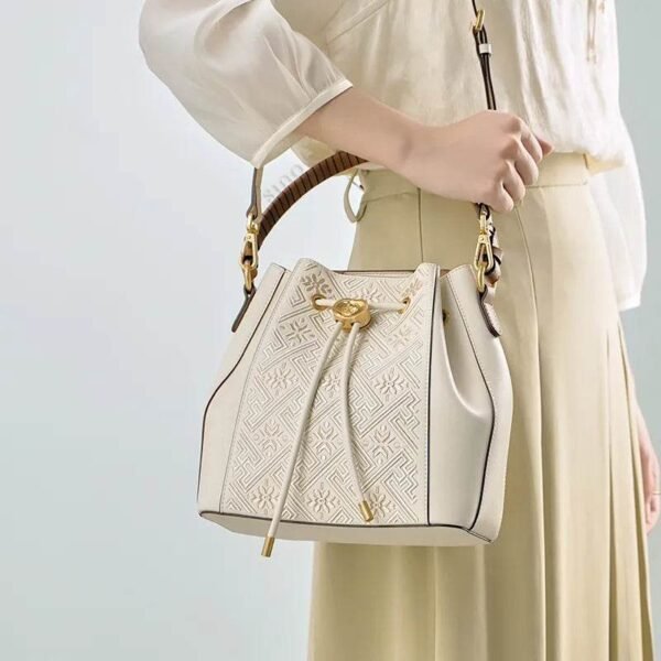 wanj-pattern-embroidered-leather-convertible-backpack-tote-model-shoulder-handheld wanj-pattern-embroidered-leather-convertible-backpack-tote-model-shoulder-handheld